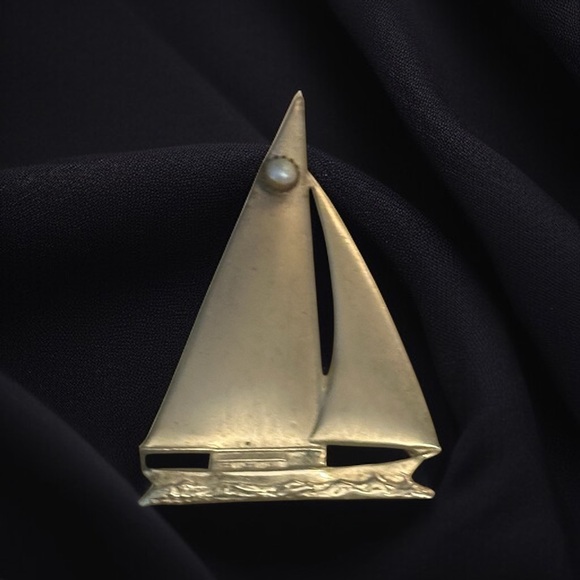 Vintage Jewelry - Vintage brass sailboat brooch with pearl accent